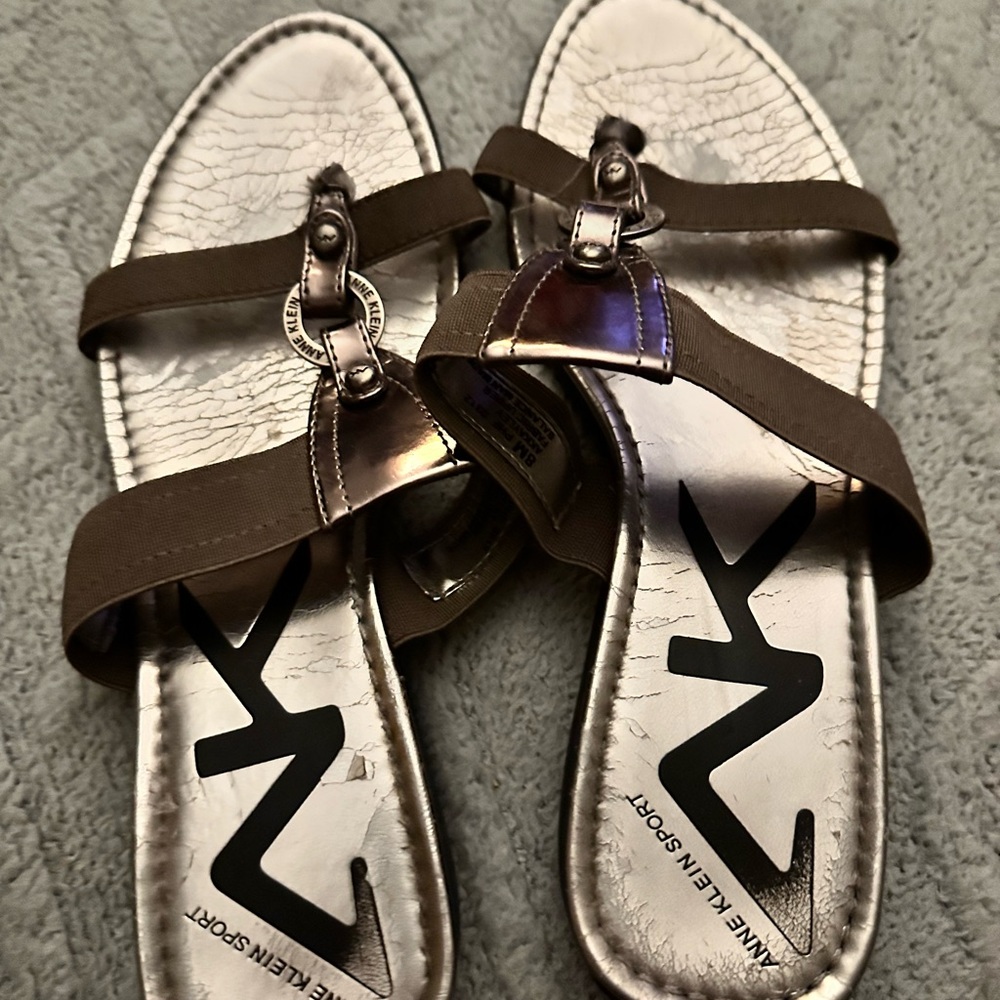 Anne Klein sport silver sandal size 8. Color buckle front